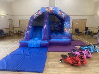 blue bouncy castle with slide hire in Shrewsbury